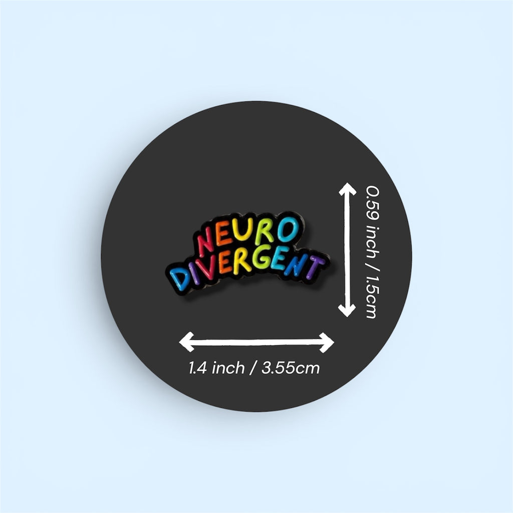 Neurodivergent pin with size measurements on a black circle against a light blue background