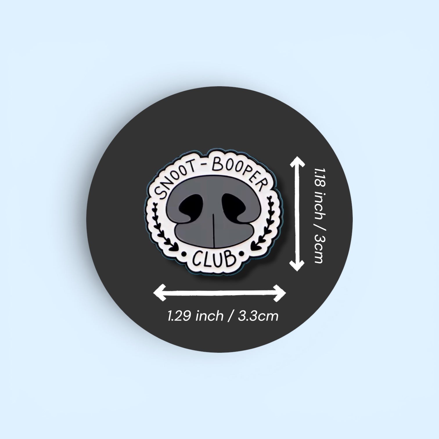 Pin with 'Snoot Booper Club' design and size measurements on a black background