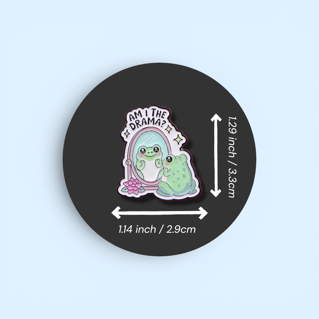 Pin with cartoon characters and text 'Am I the drama?' on a black background with measurements.