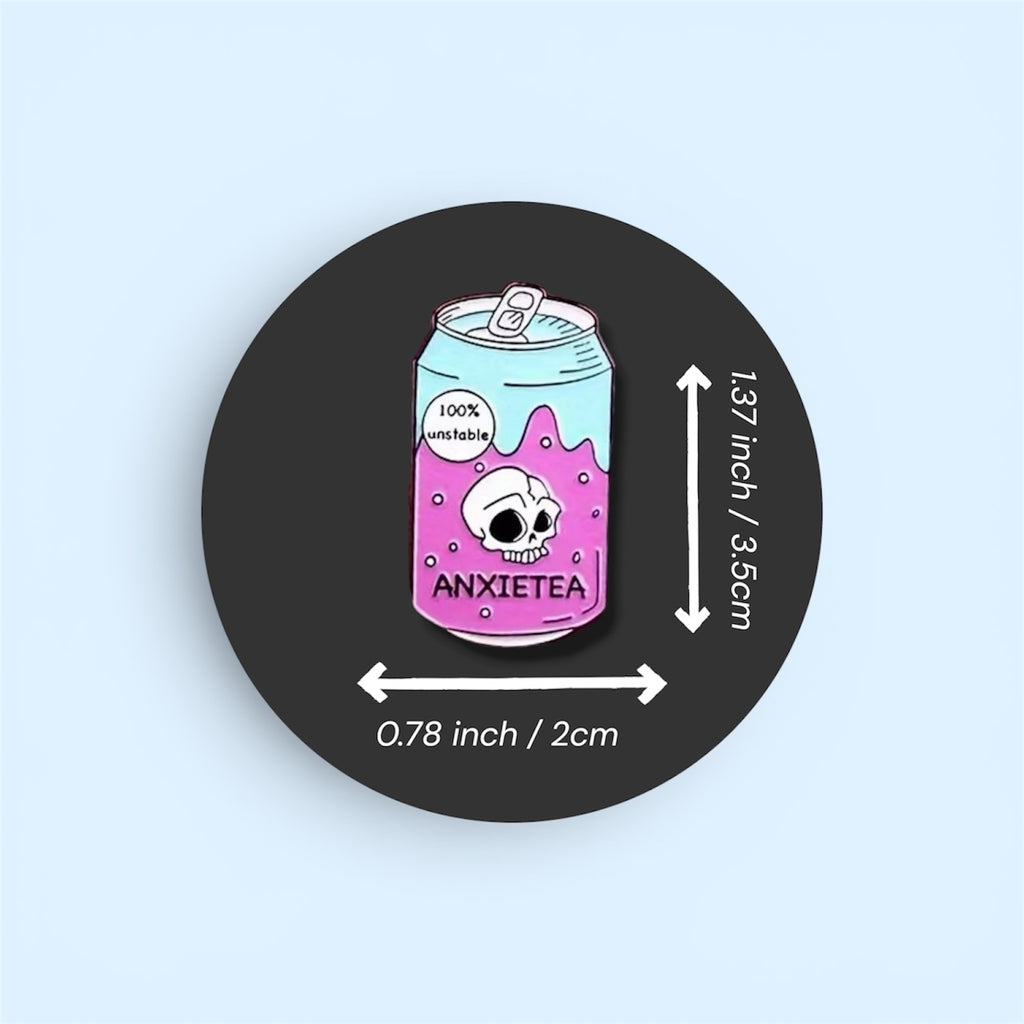 Pin with a can design labeled 'Anxietea' on a black background with measurements.