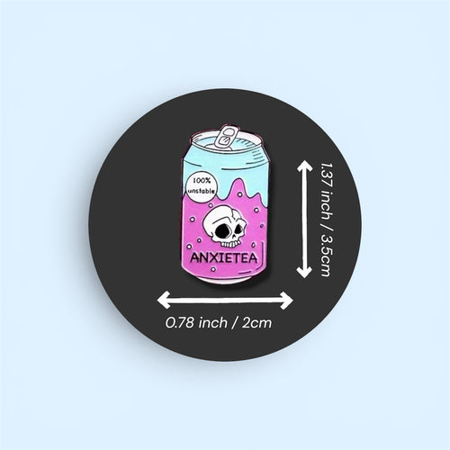 Pin with a can design labeled 'Anxietea' on a black background with measurements.