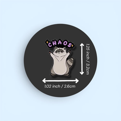 Pin with a raccoon illustration and 'CHAOS' text on a black background