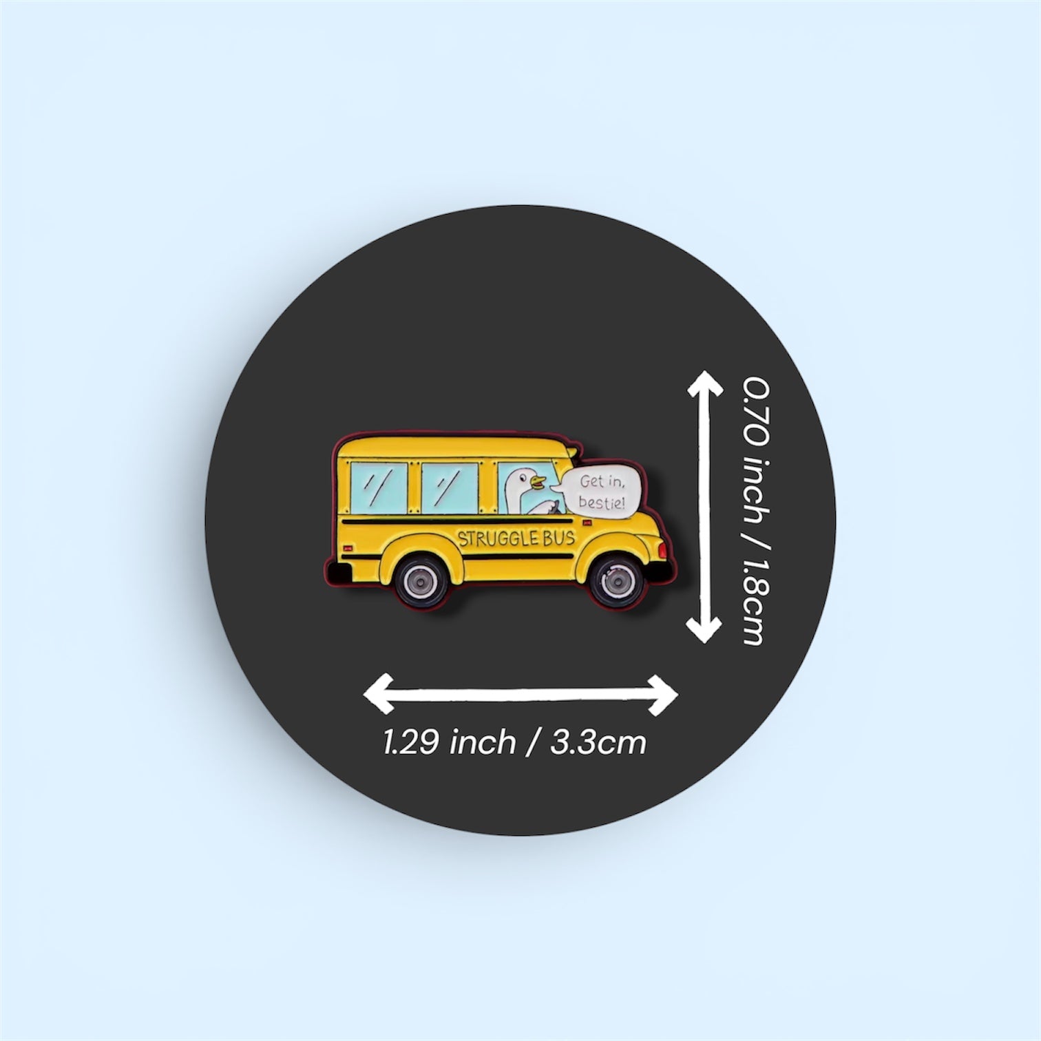 Pin with a school bus design titled the 'struggle bus' and measurement details on a black circle